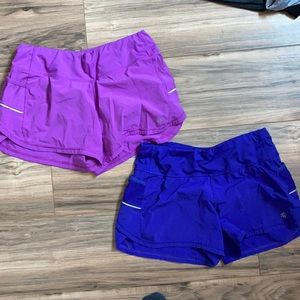 2 pairs of size XS Athleta running shorts